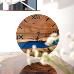 Handcrafted Walnut Wood Wall Clock with Deep Blue Epoxy River and Roman Numerals