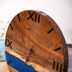 Handcrafted Walnut Wood Wall Clock with Deep Blue Epoxy River and Roman Numerals