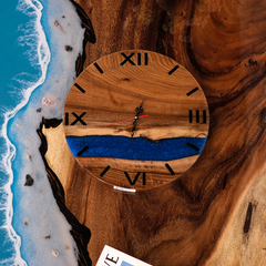 Handcrafted Walnut Wood Wall Clock with Deep Blue Epoxy River and Roman Numerals