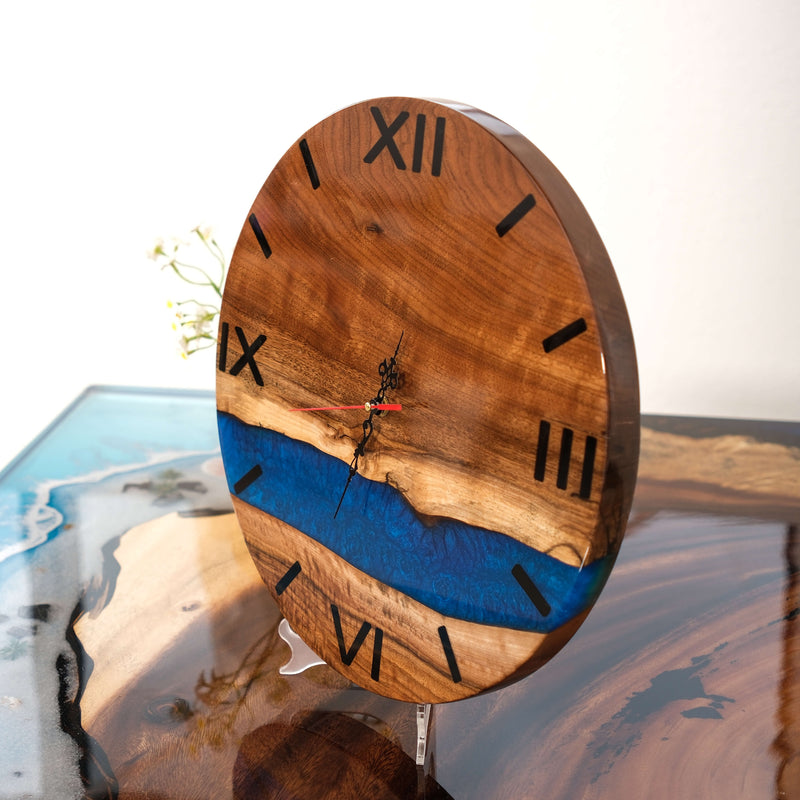 Handcrafted Walnut Wood Wall Clock with Deep Blue Epoxy River and Roman Numerals