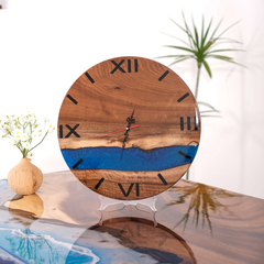 Handcrafted Walnut Wood Wall Clock with Deep Blue Epoxy River and Roman Numerals
